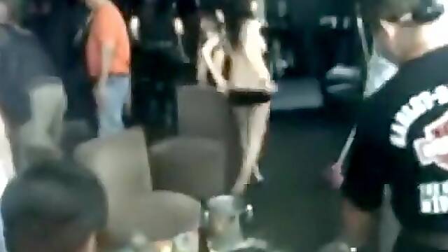 Guys have fun with 4 pattaya strippers in a bar