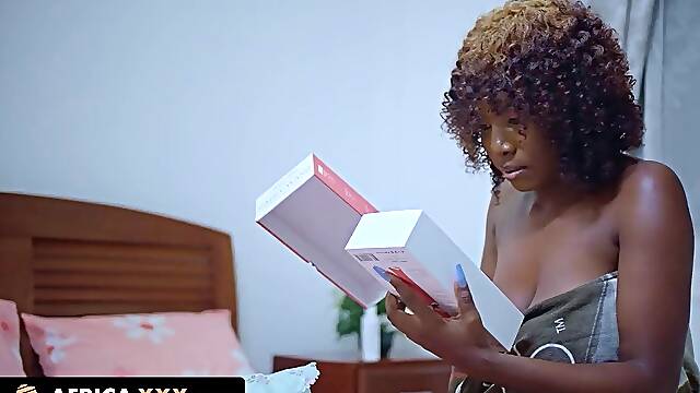 The busty african babe tries out a new dildo