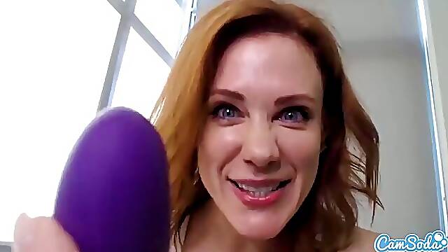 Maitland Ward is a smashing, red haired milf who likes to masturbate in front of the camera