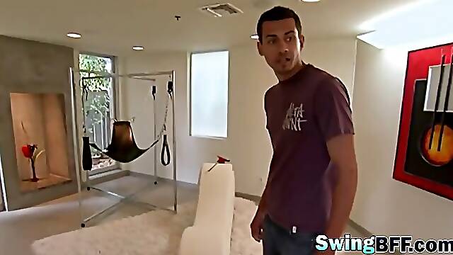 Swinger couples enjoying striptease in mansion