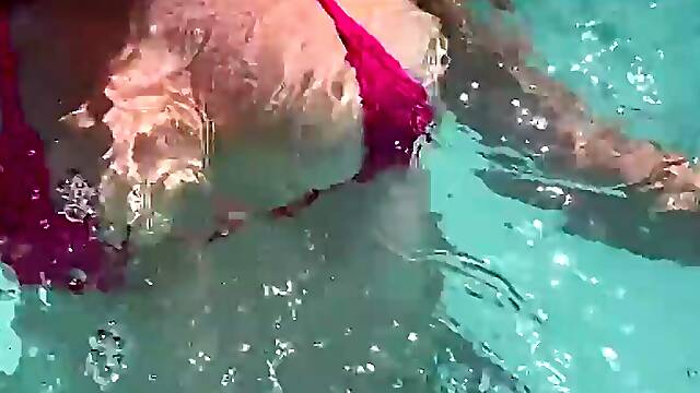 Busty Artemisia Love showcases her perfection in a micro bikini underwater