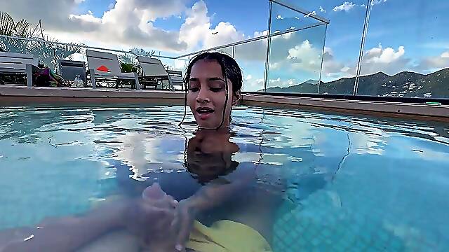 Busty wife Yasmine Khan gives a wet and wild poolside blowjob