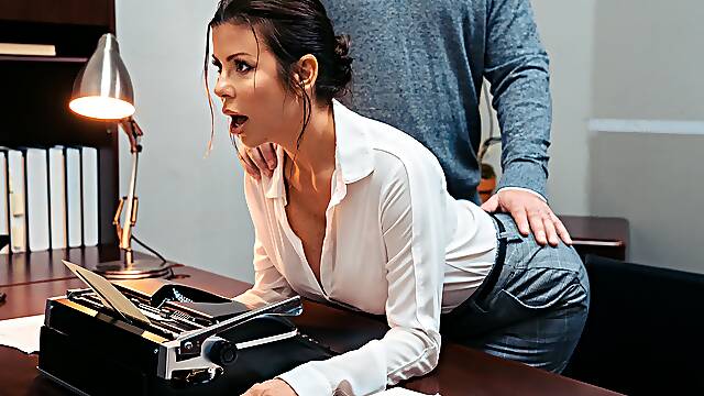 Handsome dude fucks his busty secretary in both holes