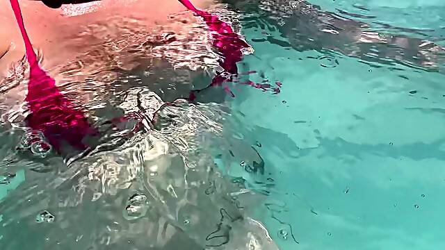 Artemisia Love showing her wet large titties in a micro bikini underwater Link. in bio