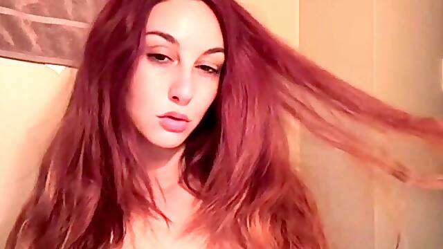 European Stepmom Artemisia Love wearing a micro bikini and cigarette smoke