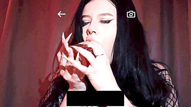 Gothic biotch with huge boobs and an ass called me on FaceTime to show me how she sucks oral pleasure on a huge monster fake penis