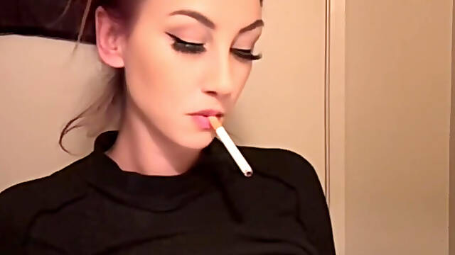 Artemisia Love smoking a cigarette and showing her perfect tits
