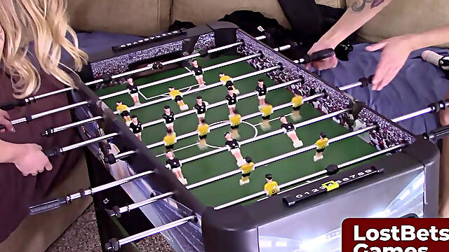 Dylan and Carmen are back for a thrilling game of Strip Foosball