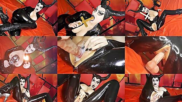 Demonic black latex witch summons Satan