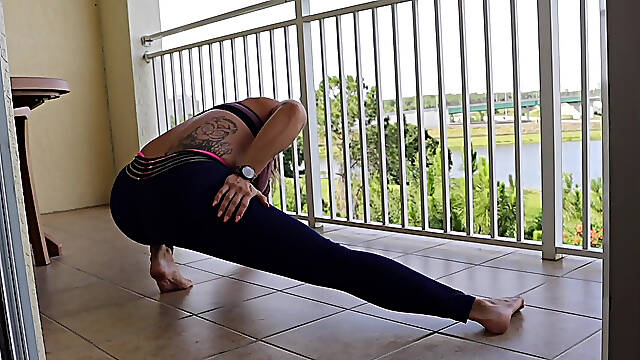 Paris Knight Stretching on the Balcony